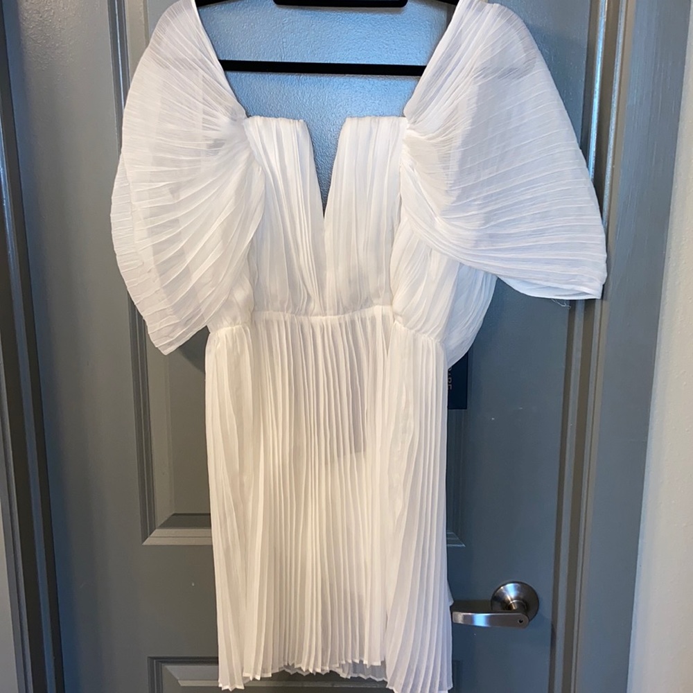 Brand new with tags, cocktail dress.